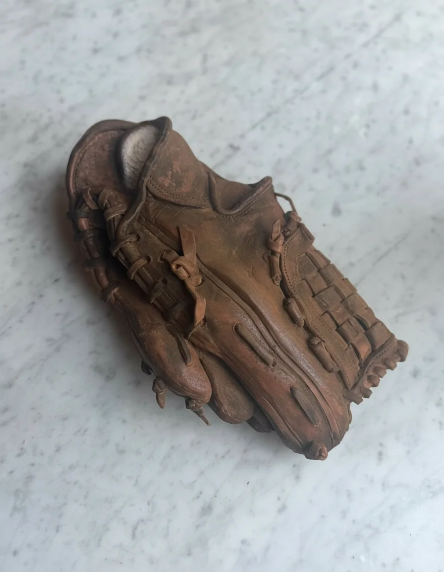 Baseball glove cake sculpture