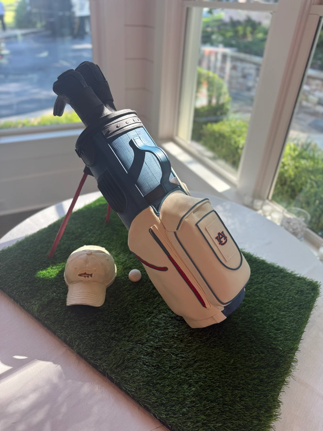 Golf bag and clubs recreated as a sculpted cake