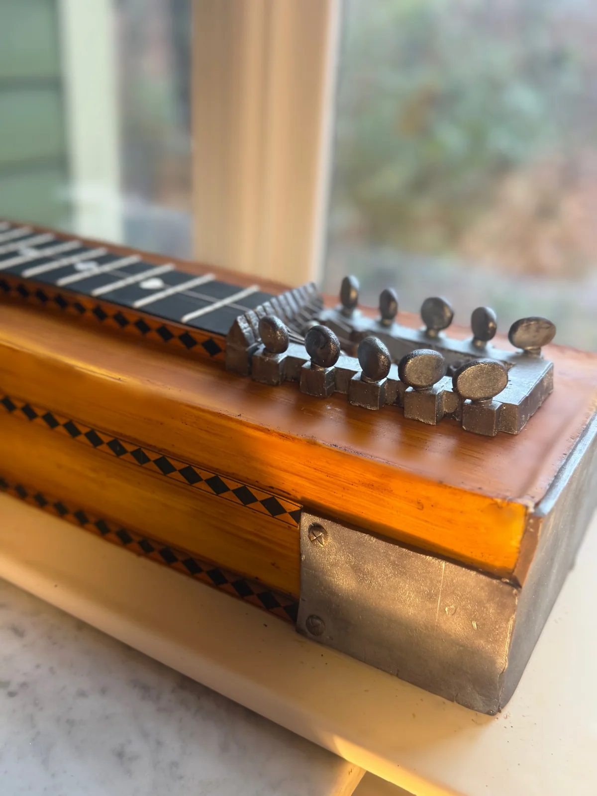 Steel guitar cake sculpture